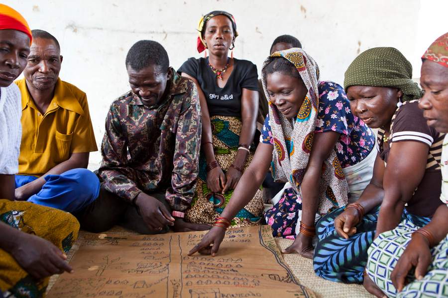 Community members meet and discuss together in Mozambique