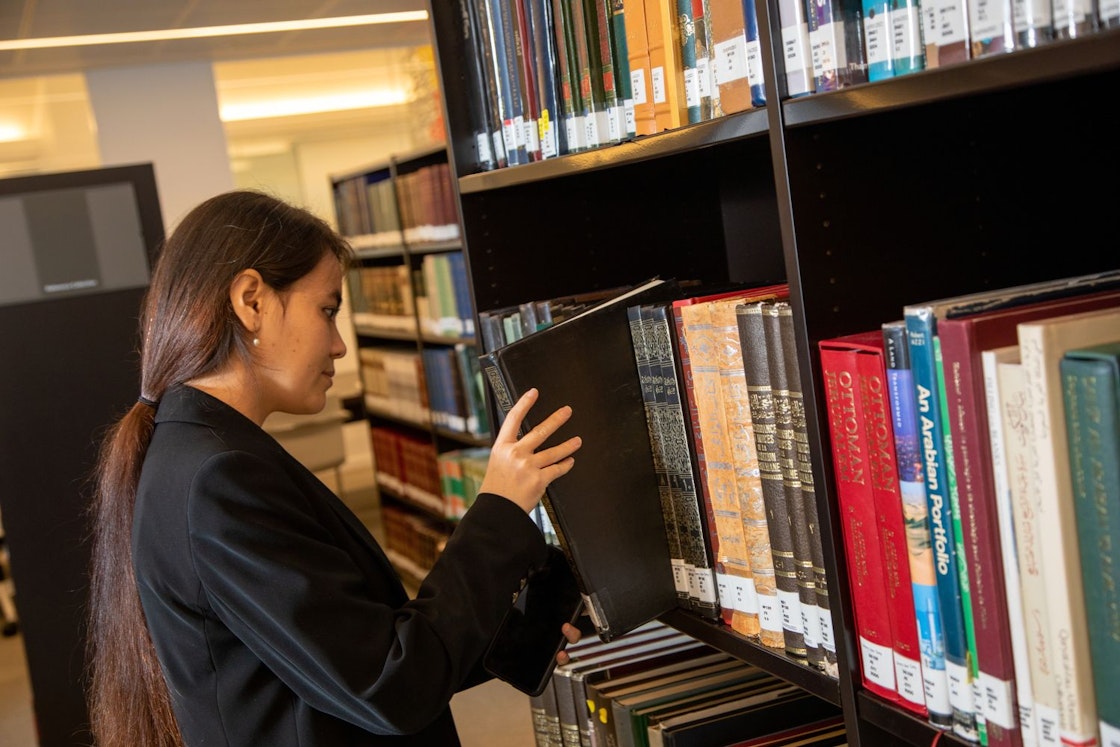 ISMC student in the Aga Khan Library, London. Photo: Jonathan Goldberg