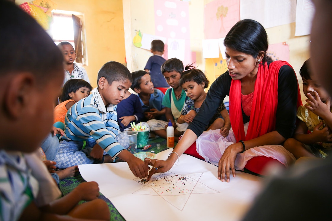 Children in Bihar, India, using the Learning at Home Kit, developed through the HCD process alongside communities to support learning at home during lockdown for communities with limited access top technology.