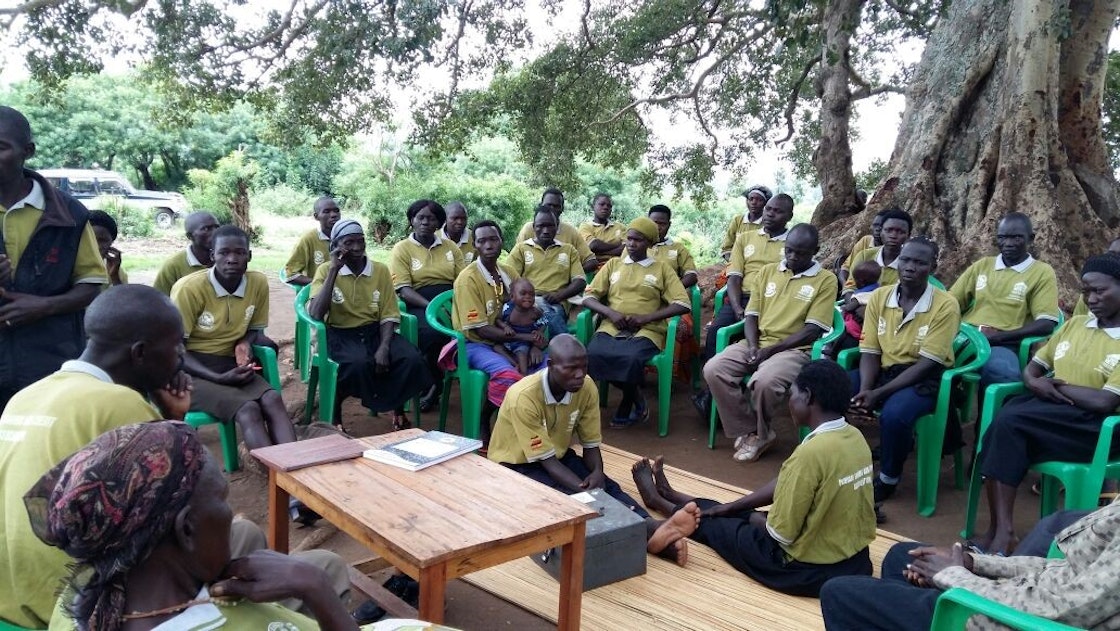 A community-based savings group in Arua district holds its weekly meeting. AKDN / Gillian Avako