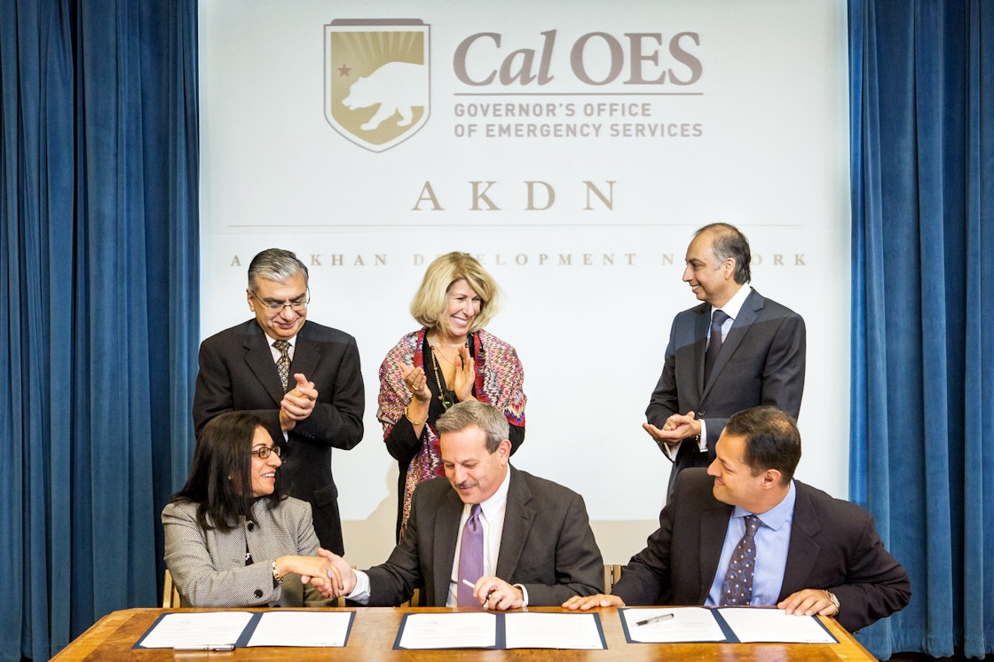 Cal OES Secretary Mark Ghilarducci joins the Aga Kahn Development Network and Firoz Verjee, Disaster Risk Managment Coordinator and Shahin Karim, Focus Humanitarian Assistance USA Chair in signing a Memorandum of Understanding between the AKDN and Cal OES. California Governor's Office of Emergency Services