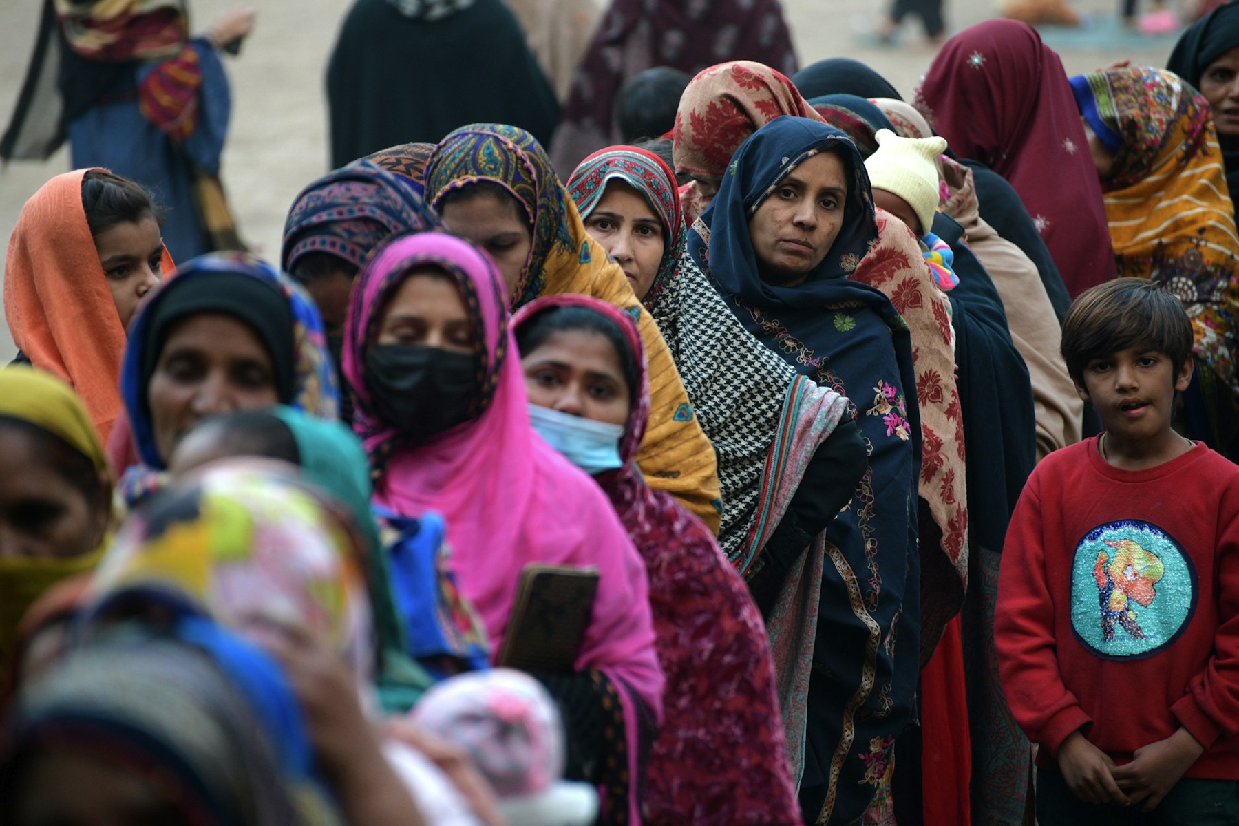 Beneficiaries receive Ehsaas funds in Lahore.