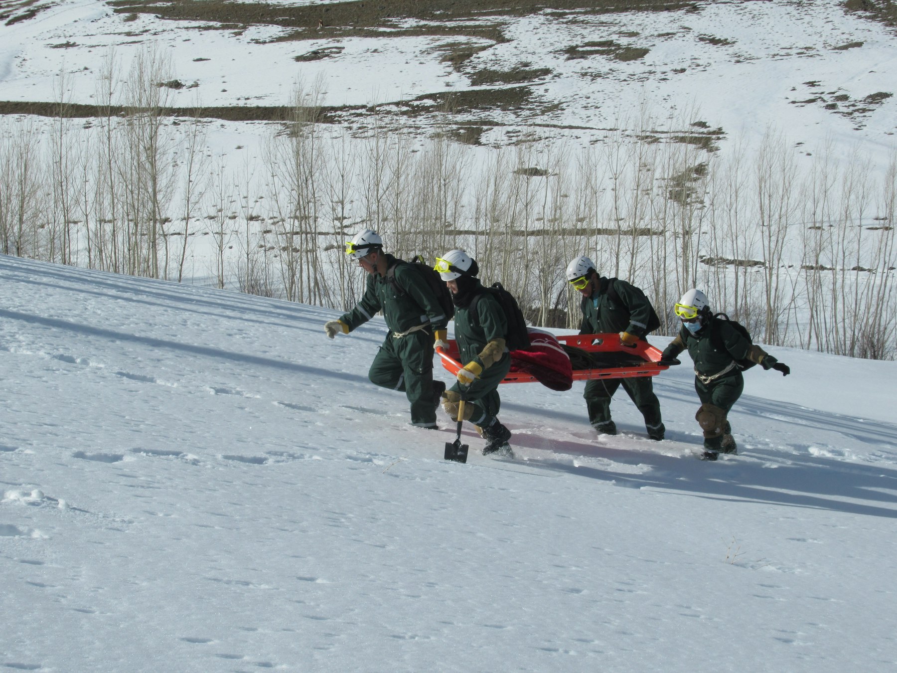 An AKAH search and rescue team conducting a simulation mock drill in Baghlan Province, Afghanistan. Photo credit: AKAH Afghanistan