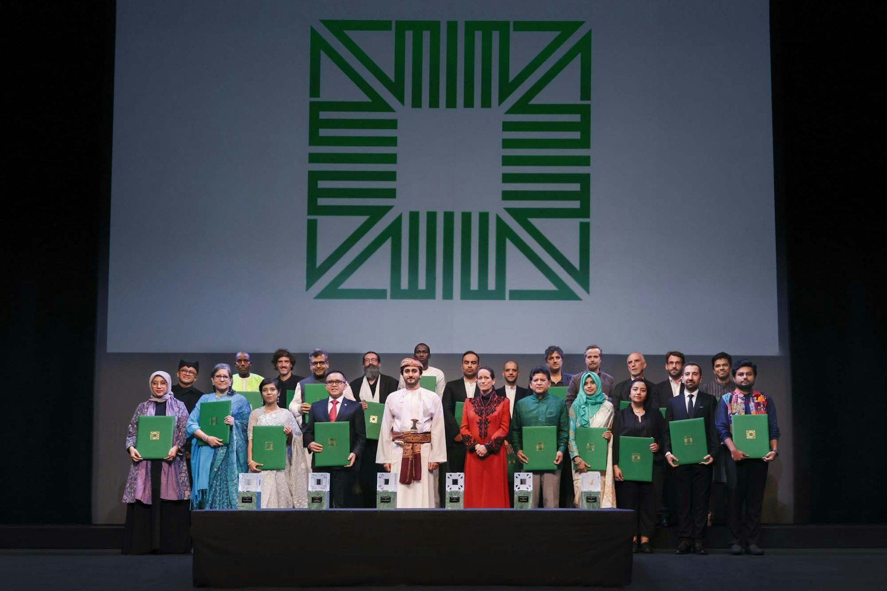 His Highness Sayyid Theyazin bin Haitam Al Said and Princess Zahra Aga Khan with the winners of the 2022 Aga Khan Award for Architecture