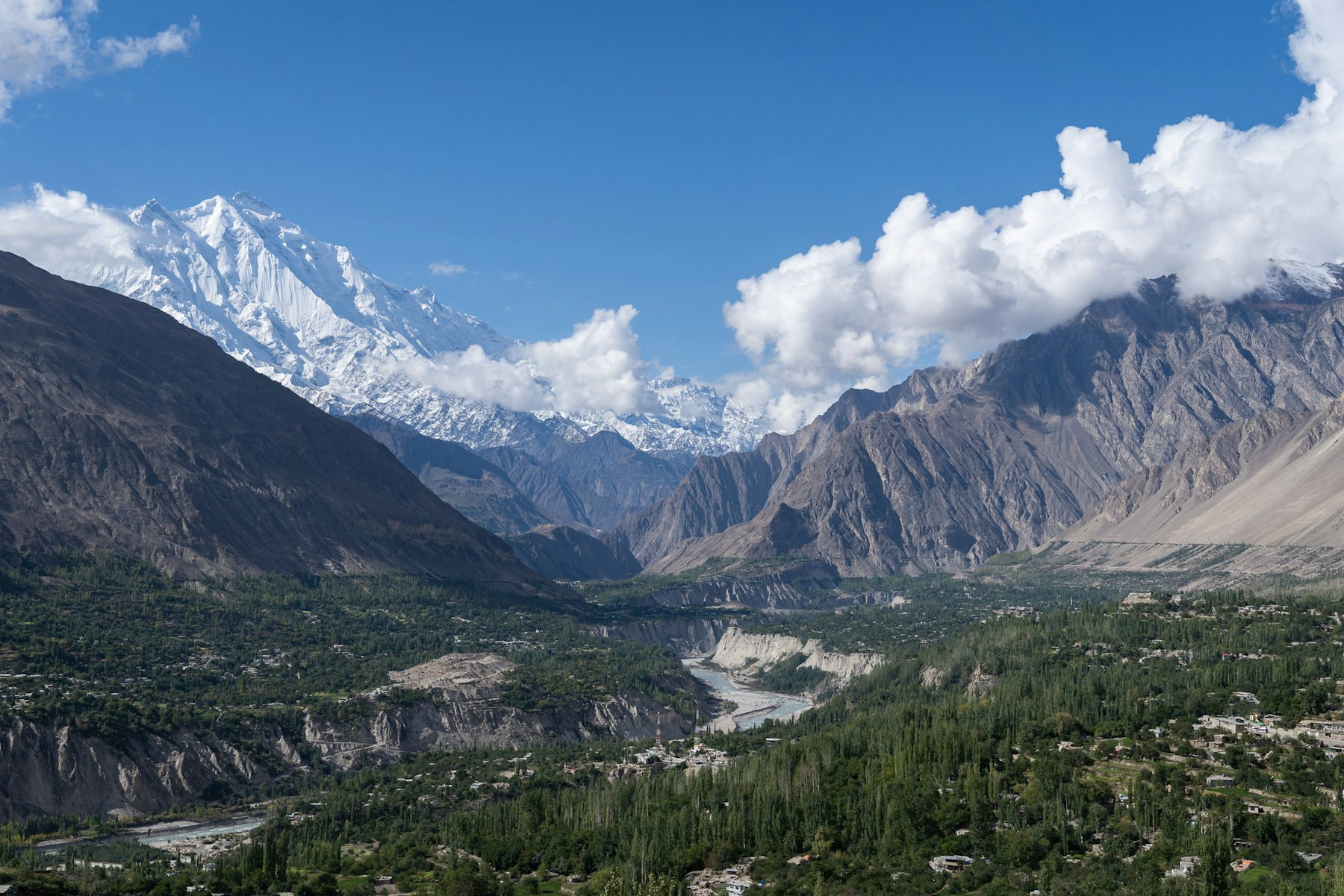 The highest irrigation channel is clearly visible on either side of the Hunza valley (and in the image below) allowing trees and crops to grow below it