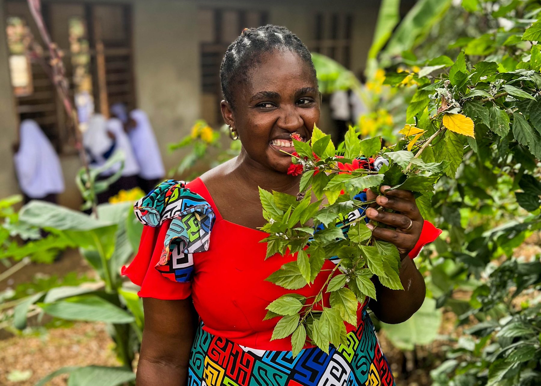 At Nzasa Secondary School in Dar es Salaam, Tanzania, Madam Lusajo Chanya has been teaching her students in the one-year-old micro-forest planted on the school grounds.